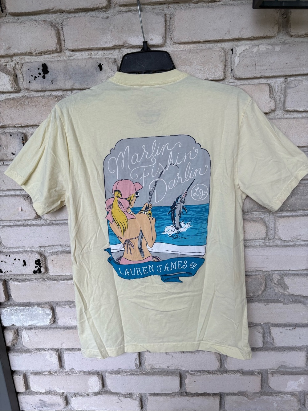 Lauren James Pale Yellow Short Sleeve Pocket Tee with fishing marlin scene back